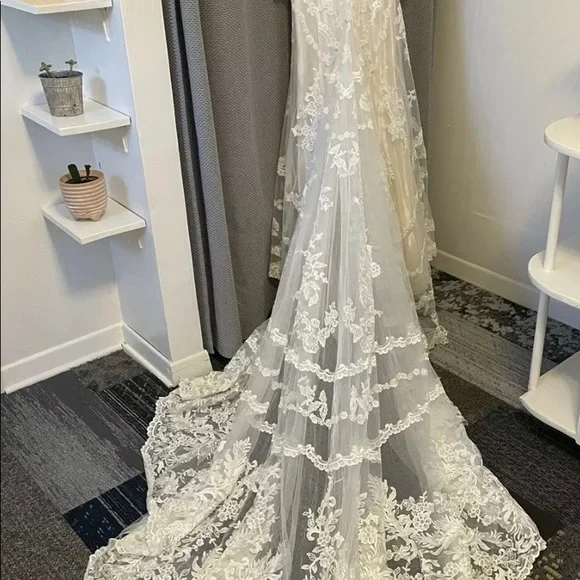 Martina Liana long sleeve Ivory wedding gown style 675